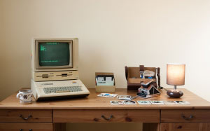 Apple IIe, DuoDisk, Apple Monitor II, retro computer, old computer, desk, camera, room, lamp