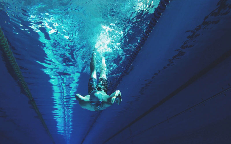 athlete, diver, diving, man, person, sports, swimmer, swimming, swimming pool, underwater