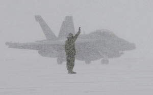 sailor, ea-18g, snow storm, blizzard, winter, military aircraft, fighter