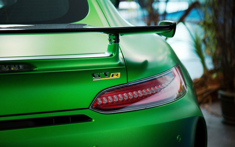 green car, cars, transportation, close-up, focus on foreground