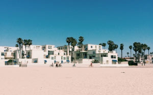 summer, resort, blue sky, clear sky, architecture, beach, buildings, daylight, houses, landscape, outdoors, sunny, sand