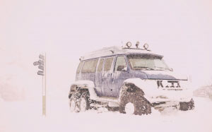 car, travel, trip, snow, winter, transportation, cold, vehicle, nature, sign, white, suv, jeep, field, outdoors, extreme weather, snowing, blizzard