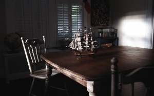 room, galleon, ship, scale model, wooden, table, dark, chair, wood, window, indoors, seat, absence, home, interior, still life, furniture