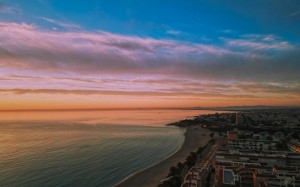 water, coast, ocean, dusk, landscape, beach, sunset, horizon, city, shore, evening, sand, sea, bay, night, cityscape, vacation, bird